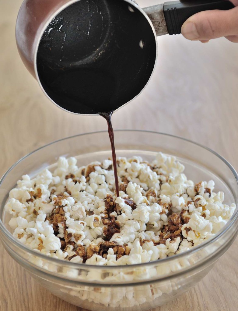 Pour salted caramel over popcorn