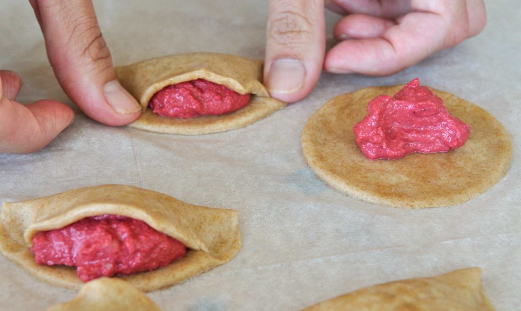 Almonds sunflower seeds and beets filled vegan empanadas