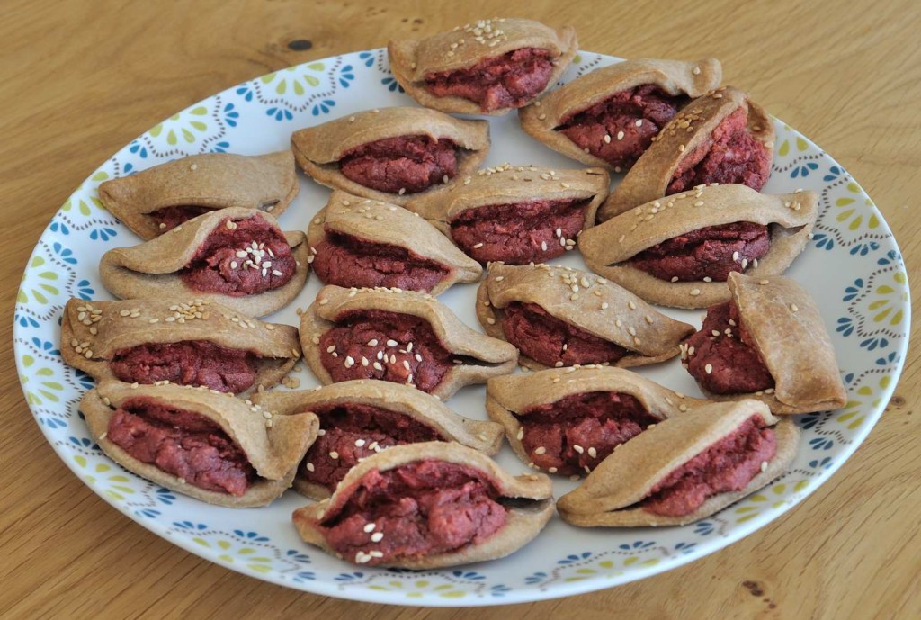 Almonds sunflower seeds and beets filled vegan empanadas